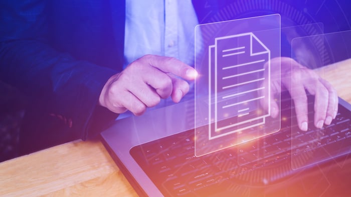 document-management-system-dms-being-setup-it-consultant-working-laptop-computer-office-software-archiving-searching-managing-corporate-files-informa