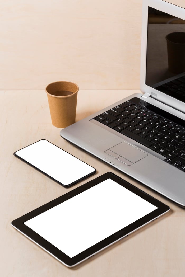 high-angle-tablet-desk-with-copy-space